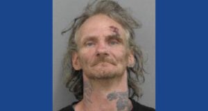 Police searching for wanted fugitive in Illinois