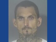 Police searching for wanted fugitive in Indiana