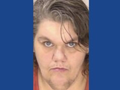 One woman arrested state children found in unlivable hotel room in Georgia