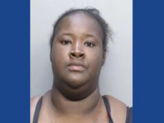 One woman arrested after child shoots himself with her gun in Florida